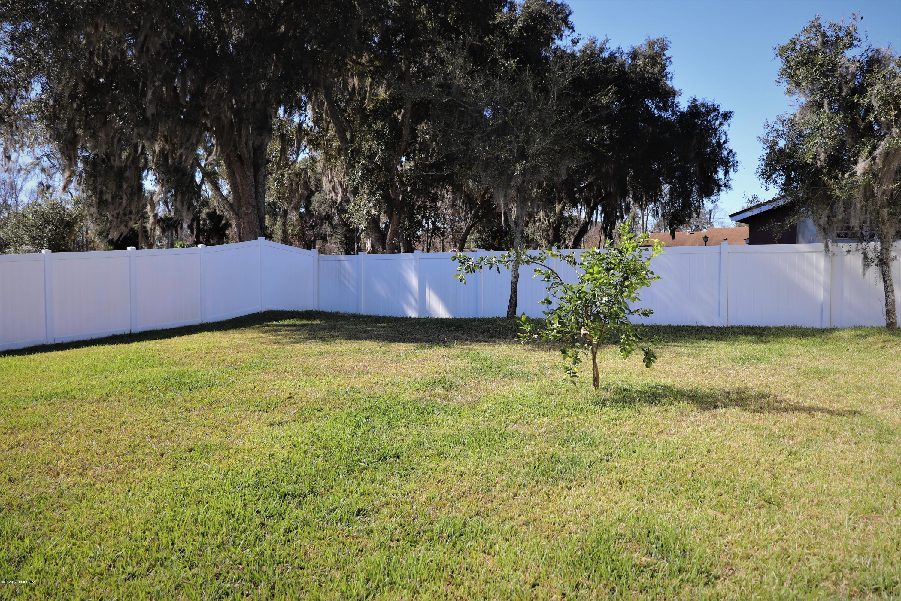 12294 Rouen Cove Drive Jacksonville, FL 32226 - Photo 6 of 41 a view of an outdoor space and a yard