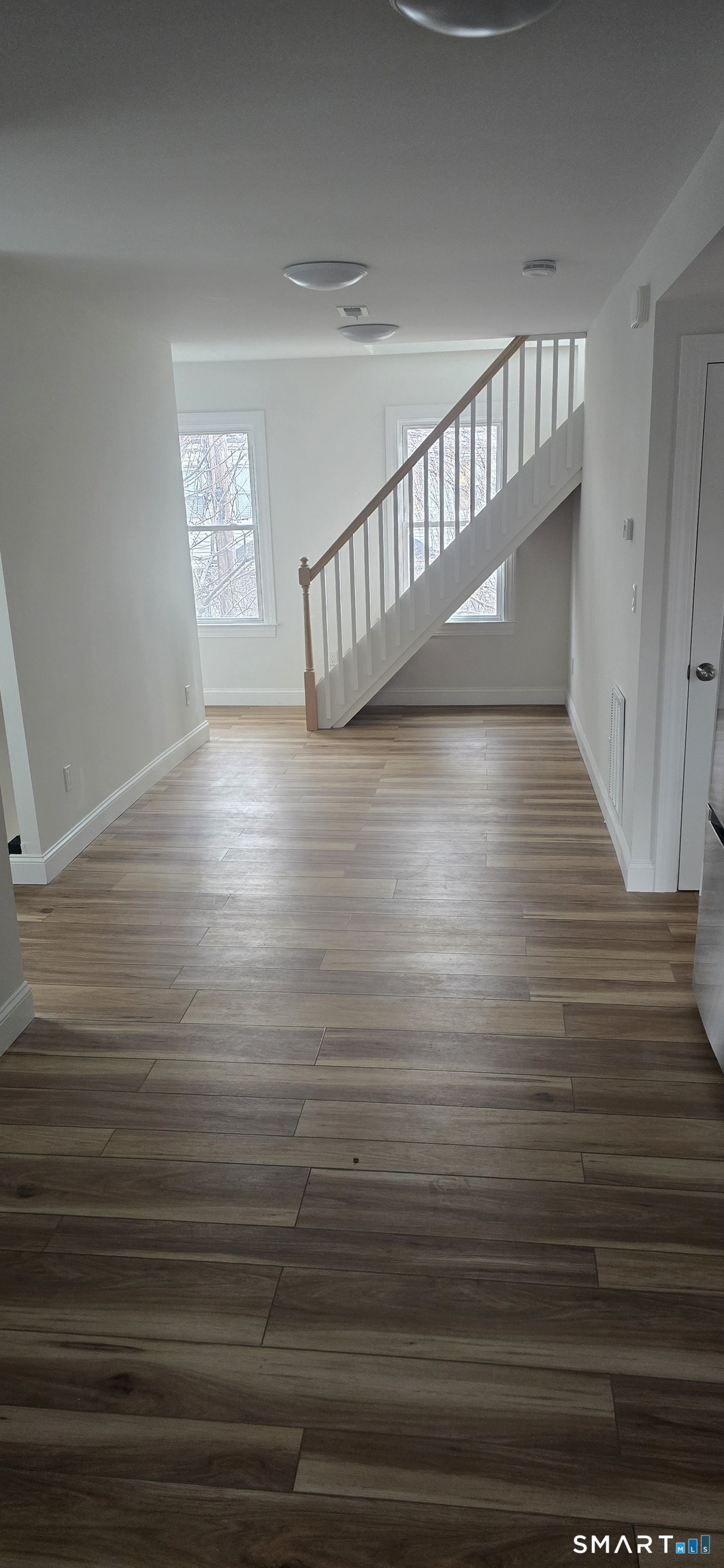 530 Jane Street, Unit 2 Bridgeport, CT 06608 - Photo 3 of 9 a view of entryway with wooden floor