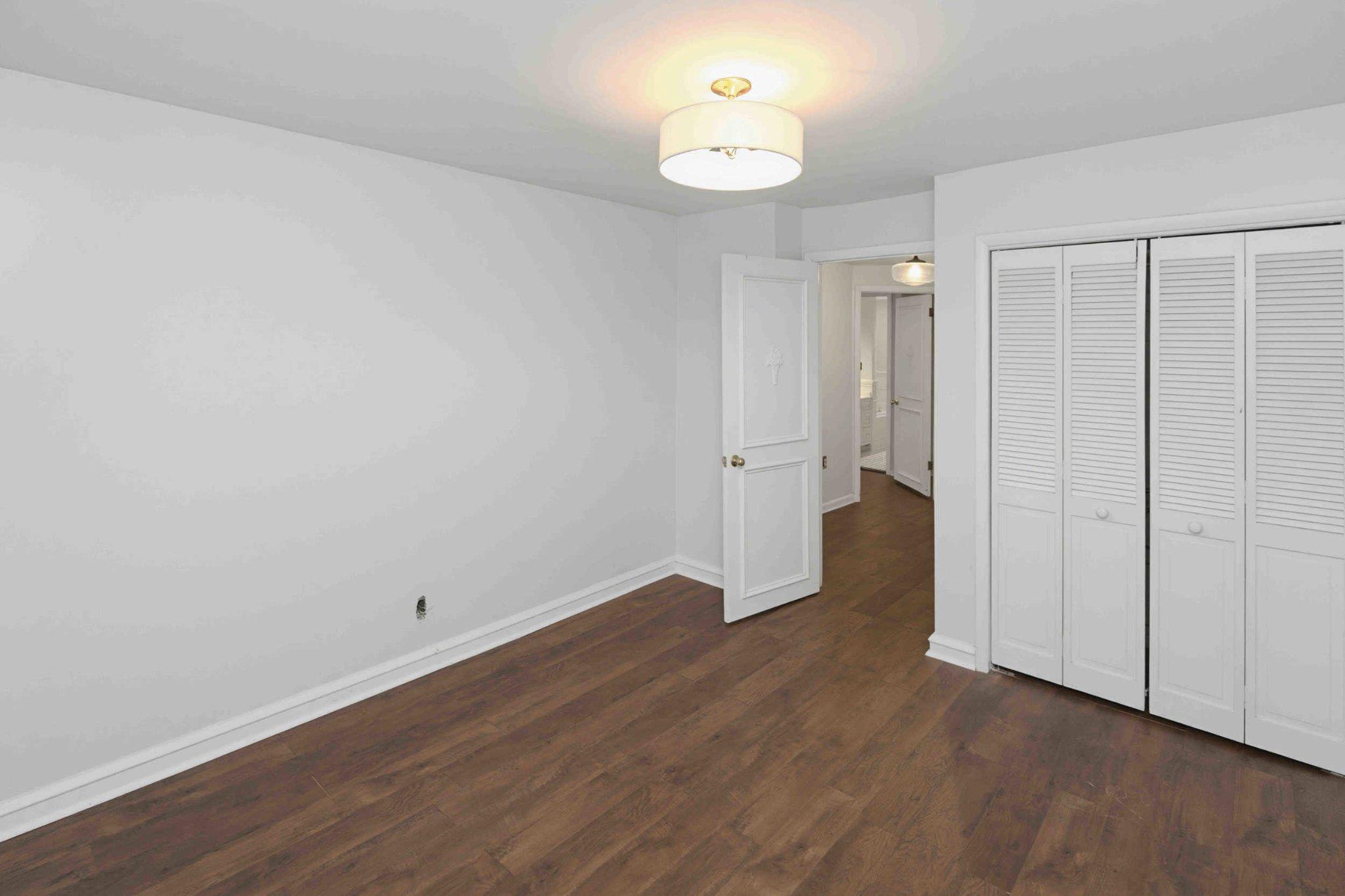 1268 Rydal Road Jenkintown, PA 19046 - Photo 20 of 31 a view of a room with wooden floor and a window