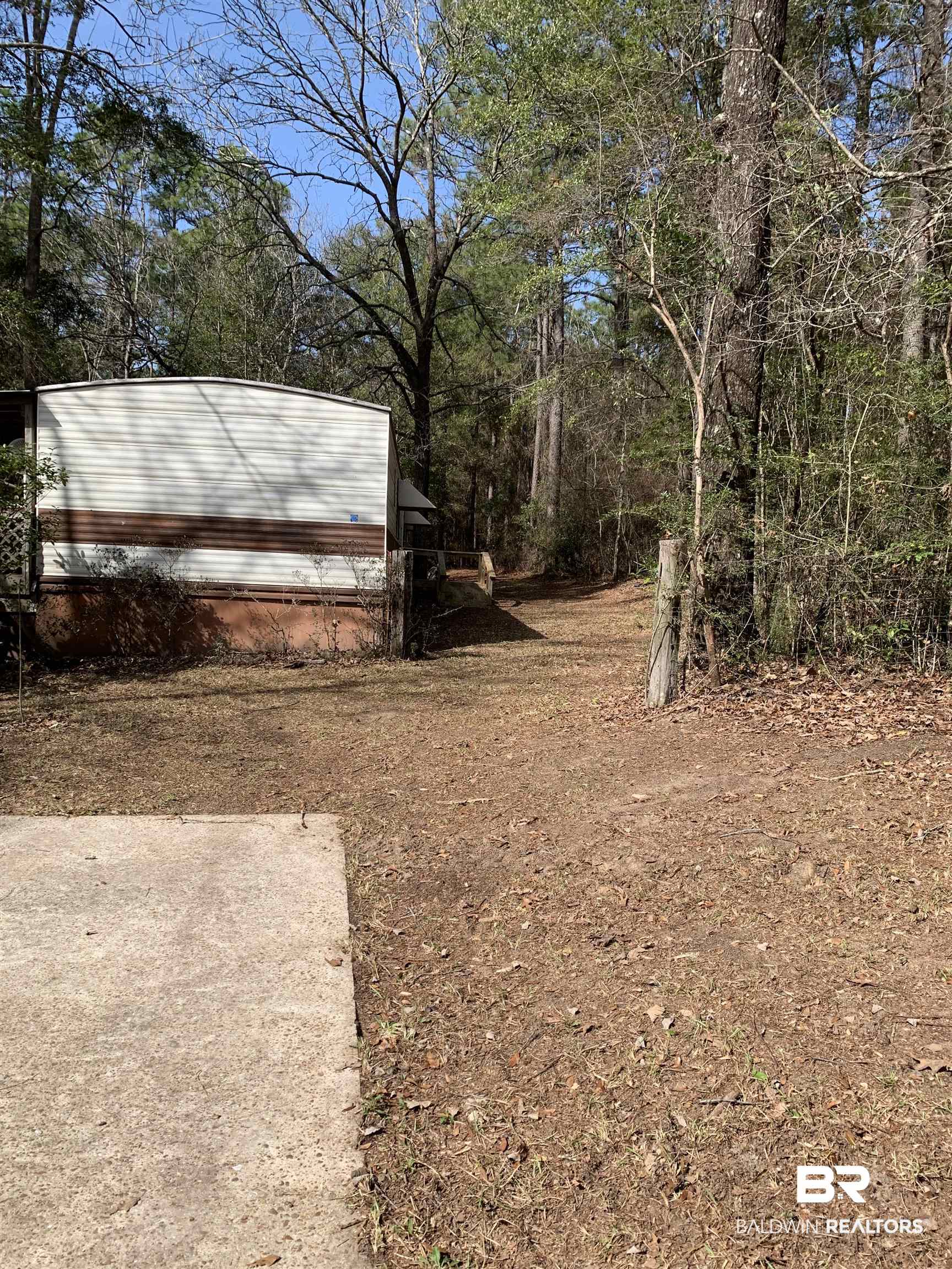 15575 Rogers Drive Chunchula, AL 36521 - Photo 3 of 42 View of yard
