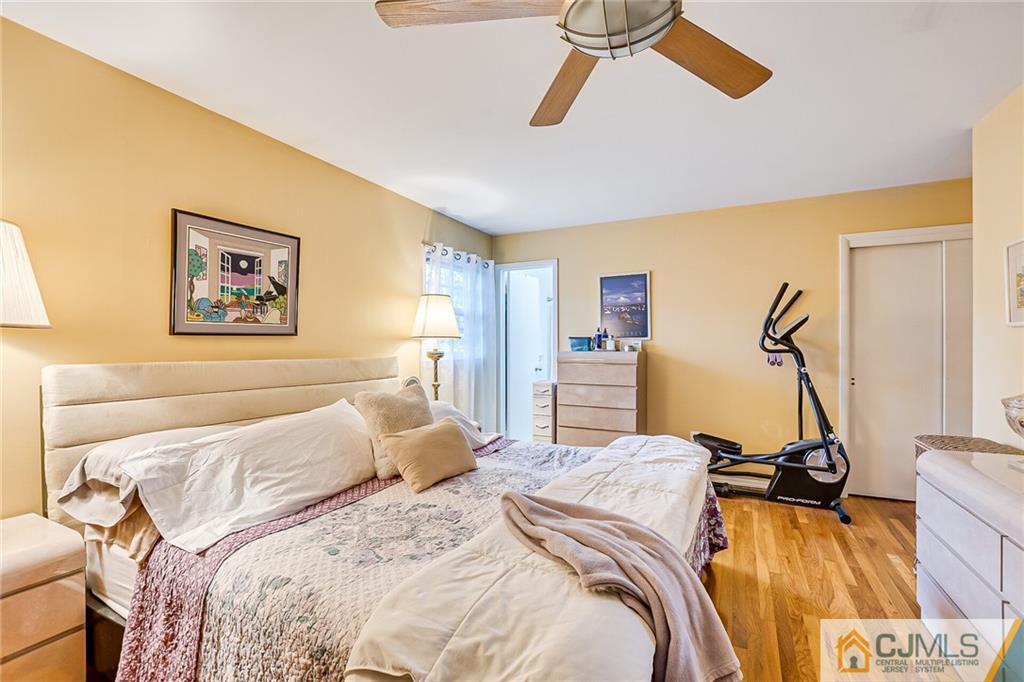 72 Monroe Avenue Edison, NJ 08820 - Photo 20 of 35 a bedroom with a bed and a desk