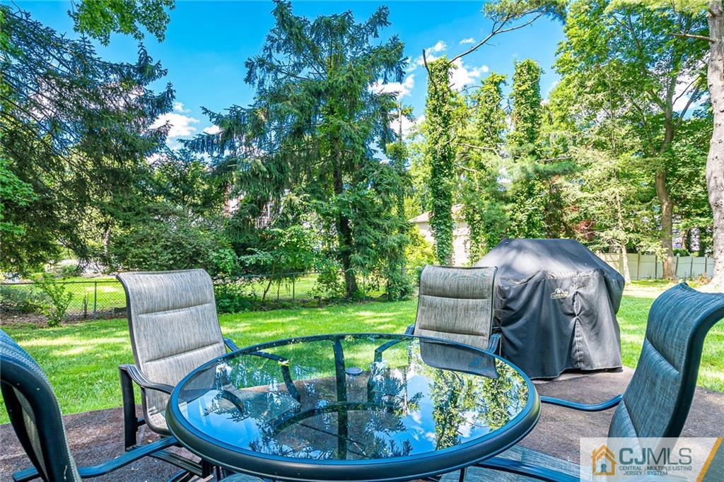 72 Monroe Avenue Edison, NJ 08820 - Photo 31 of 35 a view of a chairs in backyard of the house