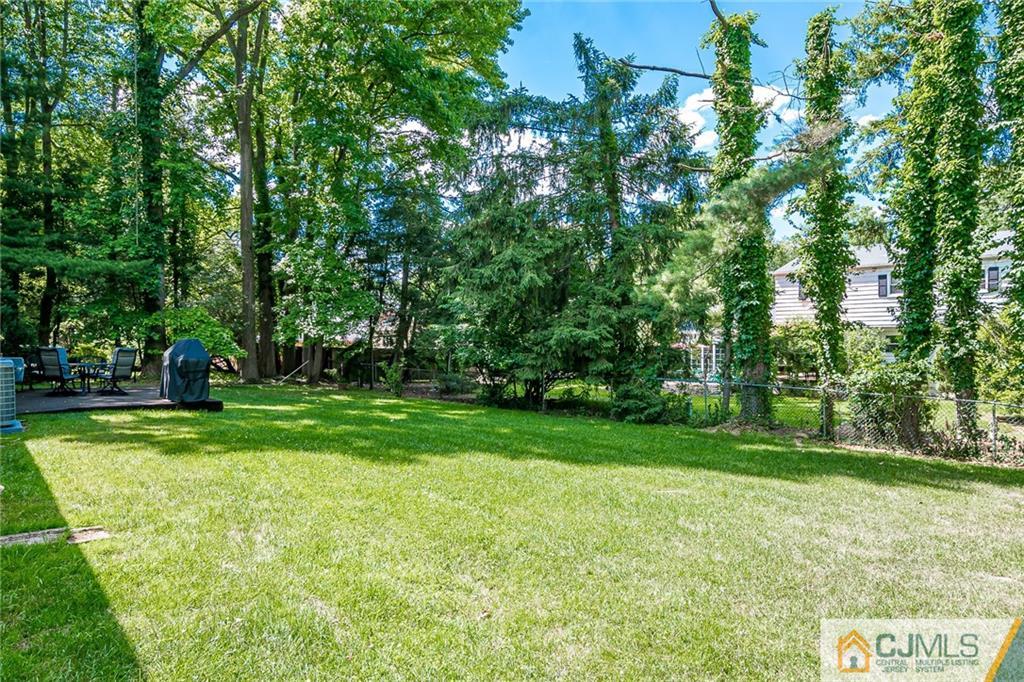 72 Monroe Avenue Edison, NJ 08820 - Photo 32 of 35 a view of a park with trees in the background