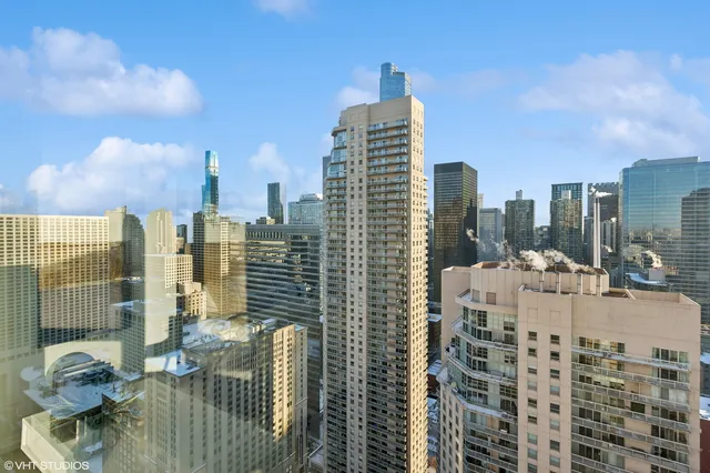 a view of city with tall buildings