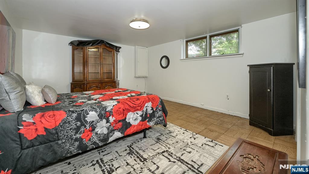 277 French Hill Road Wayne, NJ 07470 - Photo 21 of 28 a bedroom with a bed and a dresser