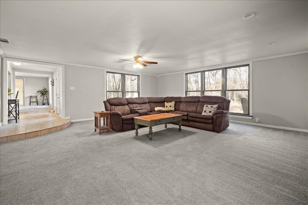 100 Sands Drive Azle, TX 76020 - Photo 12 of 31 a living room with furniture and a large window