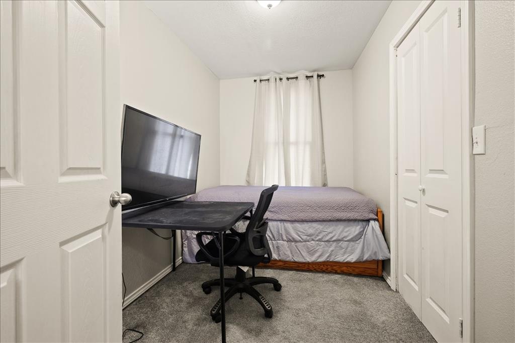 100 Sands Drive Azle, TX 76020 - Photo 20 of 31 a view of a workspace with furniture and a window