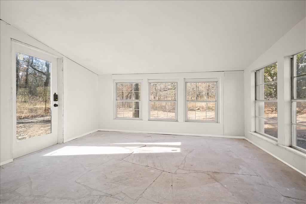 100 Sands Drive Azle, TX 76020 - Photo 28 of 31 a view of an empty room with a window