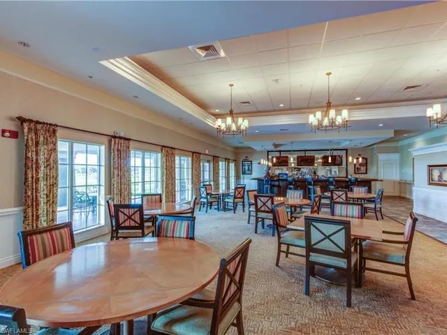 a view of a chairs and table in the patio