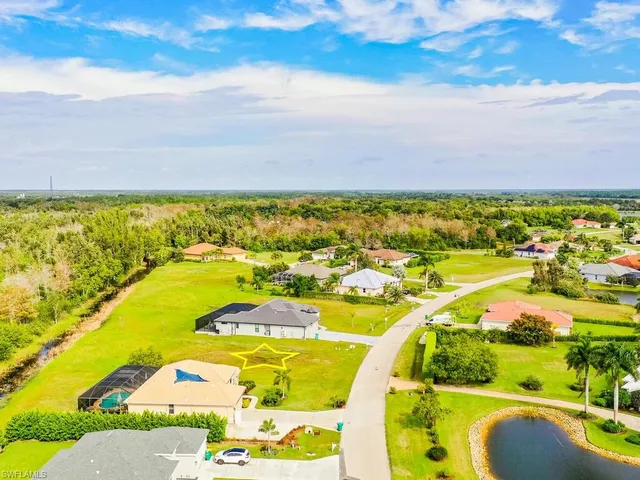 an aerial view of residential building and lake view