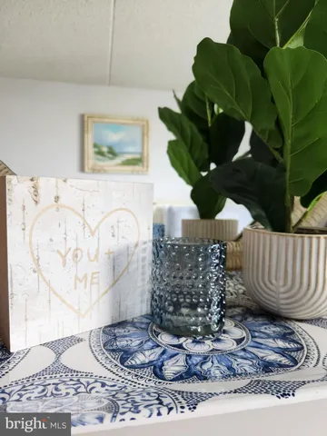 a vase of flowers sitting on a table