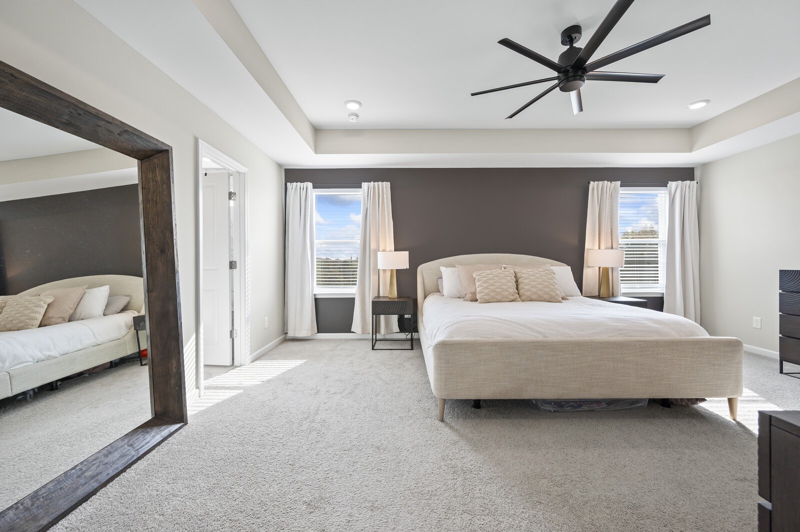 651 Castle Road Mount Juliet, TN 37122 - Photo 20 of 30 a bedroom with a bed and a large mirror