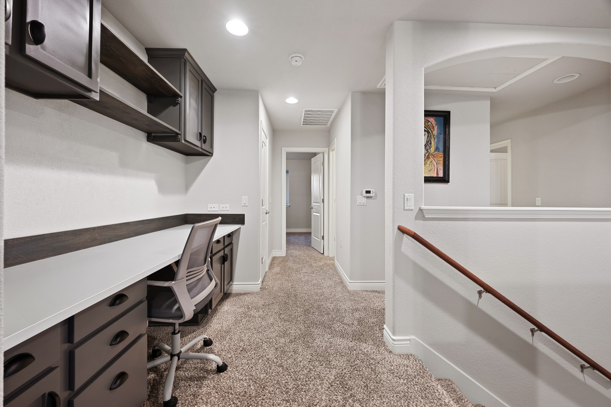 6405 Alleyton Drive Austin, TX 78721 - Photo 12 of 30 a hallway with cabinets