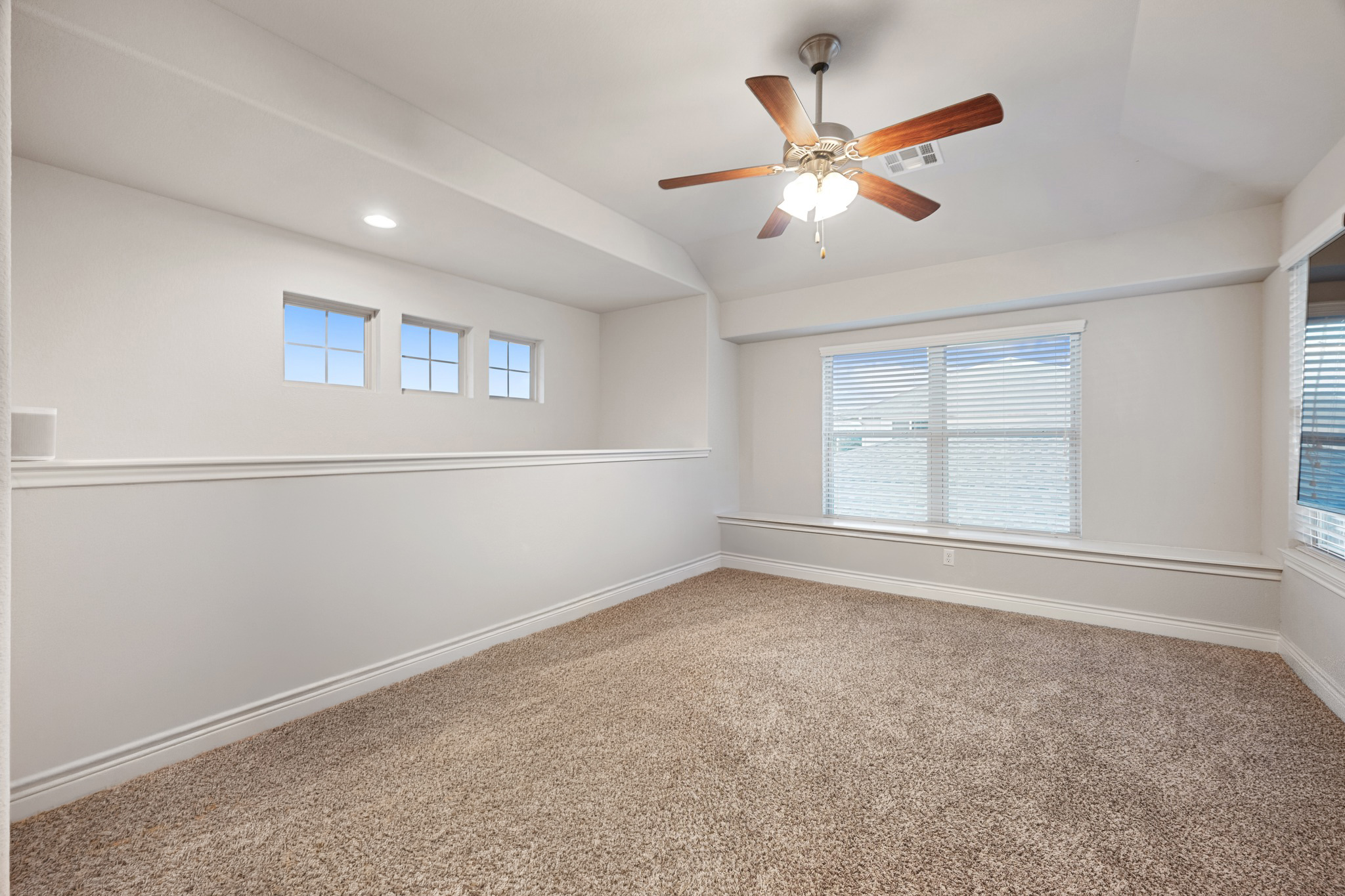 6405 Alleyton Drive Austin, TX 78721 - Photo 13 of 30 an empty room with closet and windows