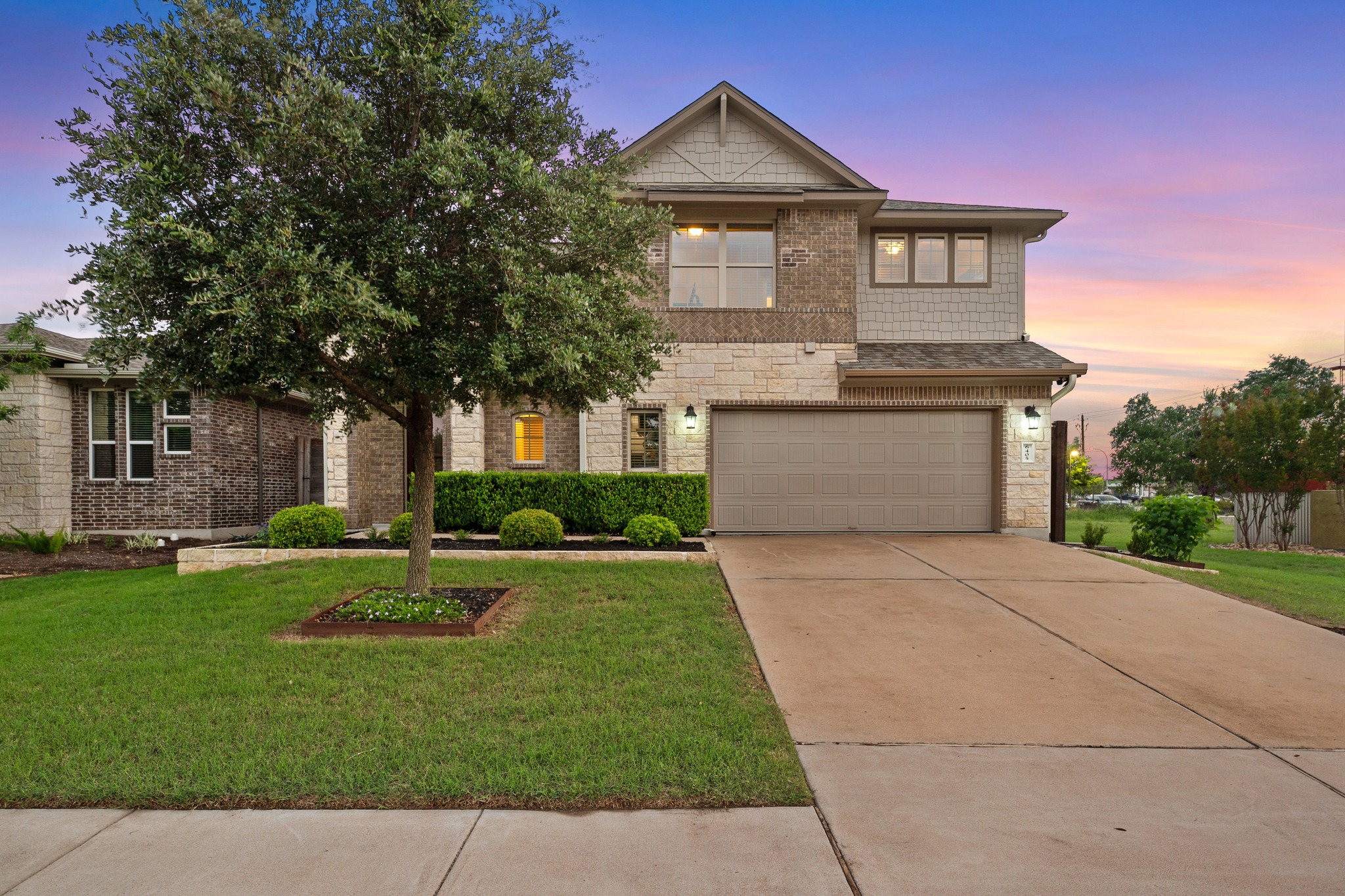 6405 Alleyton Drive Austin, TX 78721 - Photo 2 of 30 a front view of a house with a yard
