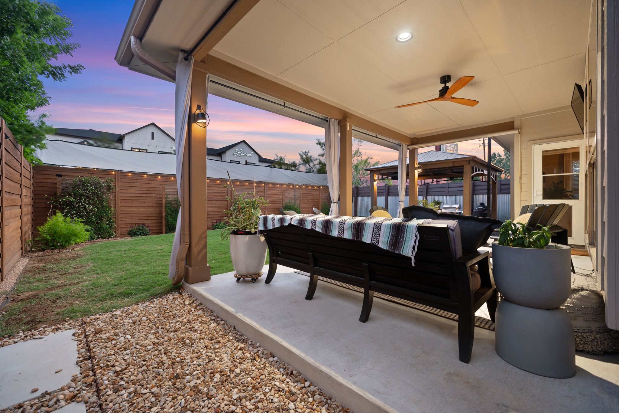 6405 Alleyton Drive Austin, TX 78721 - Photo 23 of 30 a building outdoor space with patio furniture