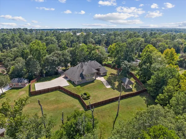 $1,150,000 | 2401 Conastoga Court, Conroe, TX 77384