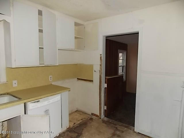 4101 South Travis Street Amarillo, TX 79110 - Photo 8 of 14 a room with storage and utility