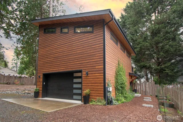 a front view of a house with a garage