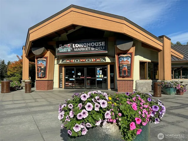 a view of terrace with wooden floor and seating space