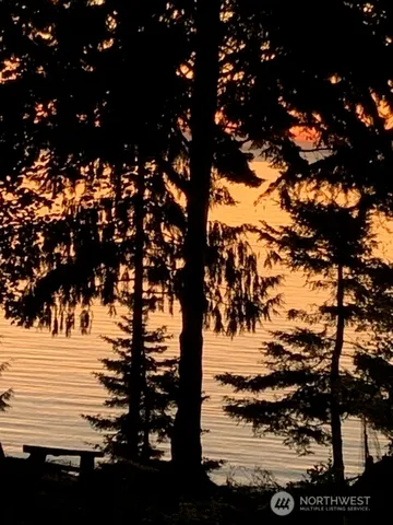 a view of outside space and a lake view