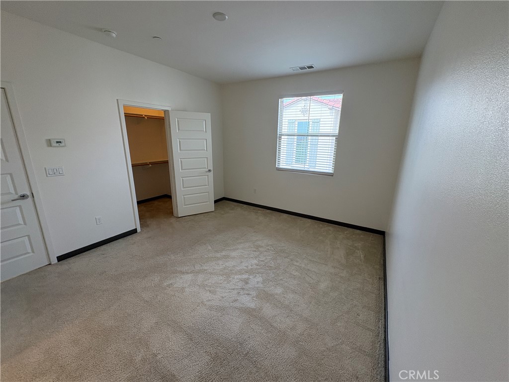 21038 Cornerstone Drive Walnut, CA 91789 - Photo 14 of 29 an empty room with windows