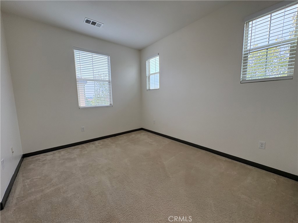 21038 Cornerstone Drive Walnut, CA 91789 - Photo 20 of 29 an empty room with a window