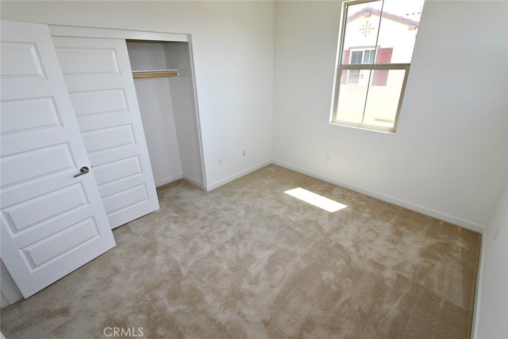 21038 Cornerstone Drive Walnut, CA 91789 - Photo 21 of 29 an empty room with windows