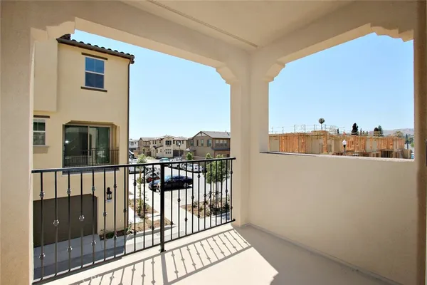 a view of a balcony with city view