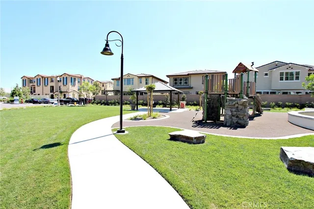 a view of a house with a park