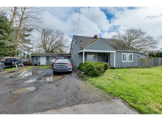 a house view with a garden space