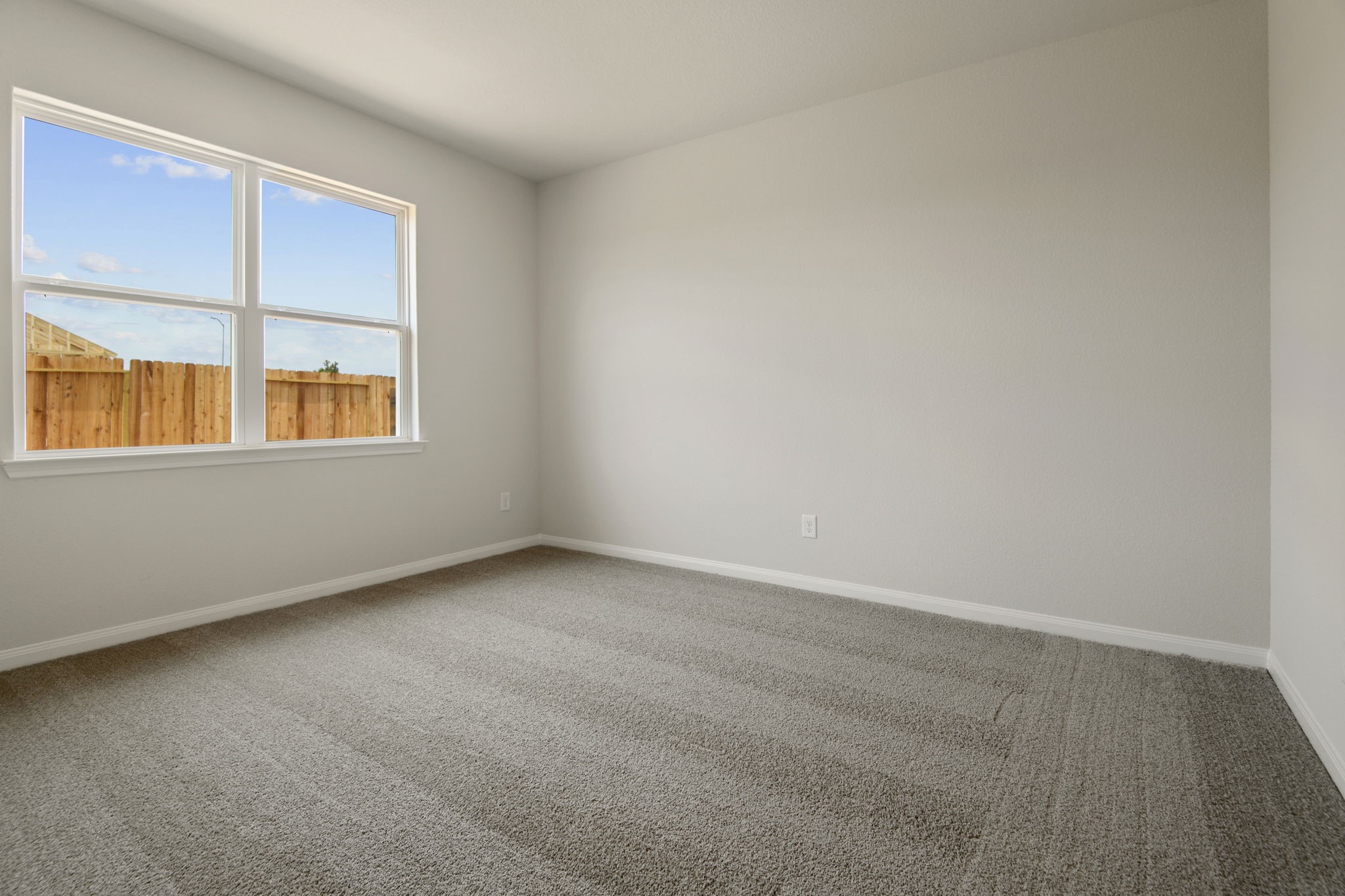 708 Jasmine Ridge Lane Waller, TX 77484 - Photo 11 of 12 an empty room with a window