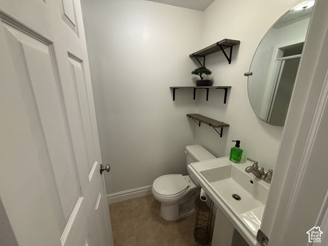 11689 South Shadow View Lane Draper, UT 84020 - Photo 18 of 25 Pedestal sink with chrome faucet, wall-mounted oval mirror, and three corner shelves