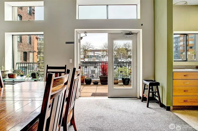 a view of a brick buildings with many windows