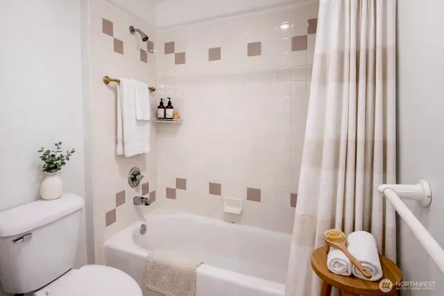 a dining room with furniture and front door