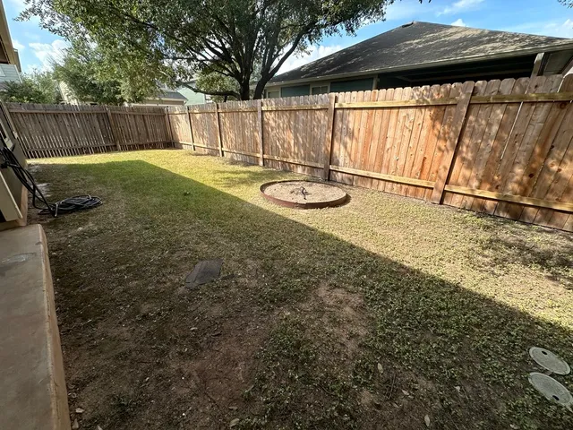 a view of outdoor space with deck and backyard