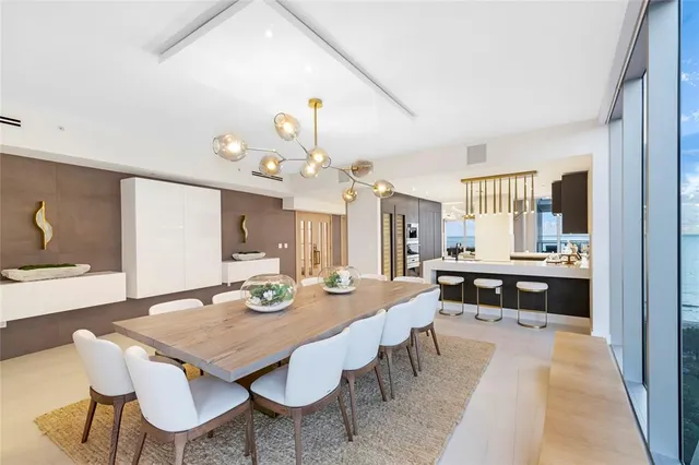 a bathroom with a double vanity sink a mirror and a shower