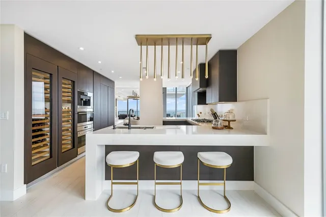 a bathroom with a toilet and a shower curtain