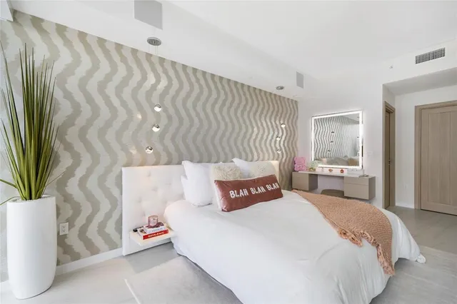 a view of a backyard with wheel chair and potted plants