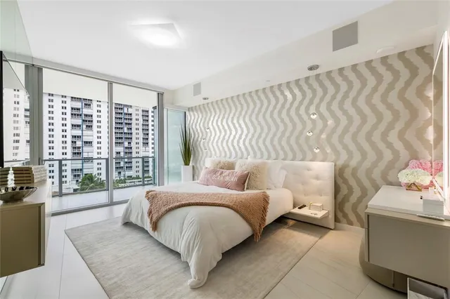 a view of a swimming pool with outdoor seating