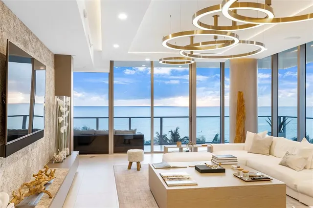 a kitchen with kitchen island granite countertop a table and chairs