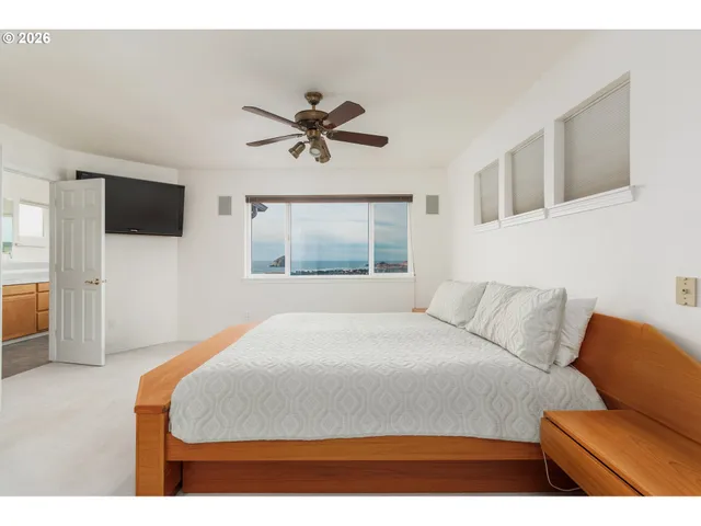 a black and white photo of a living room