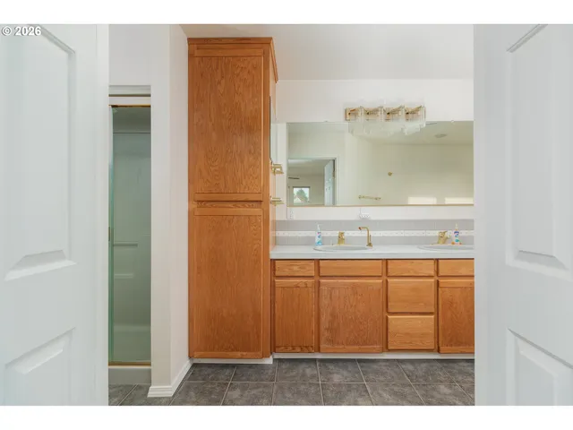 a kitchen with a sink and a window