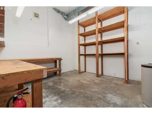 a view of balcony with wooden floor and fence