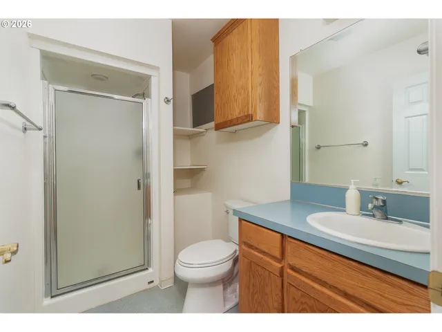 a view of a balcony with wooden floor