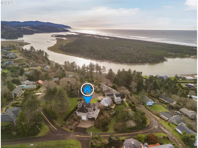 an aerial view of a golf course with parking space