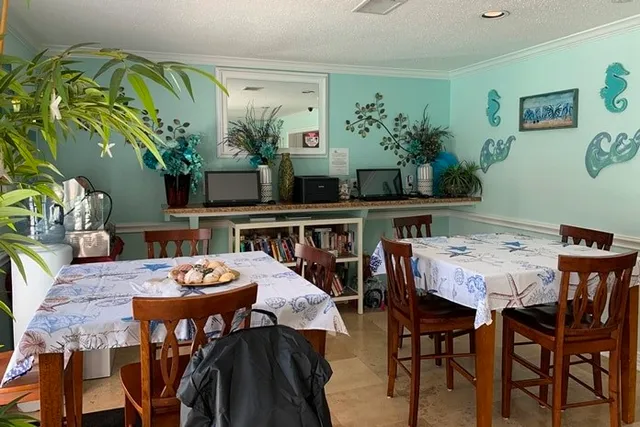 a view of a dining room with furniture