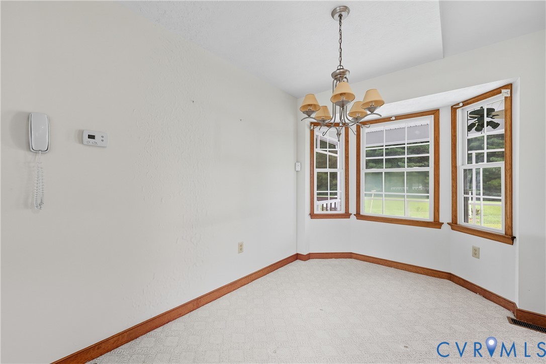 22419 Shippings Road McKenney, VA 23872 - Photo 11 of 35 Dining Area Open to Family Room