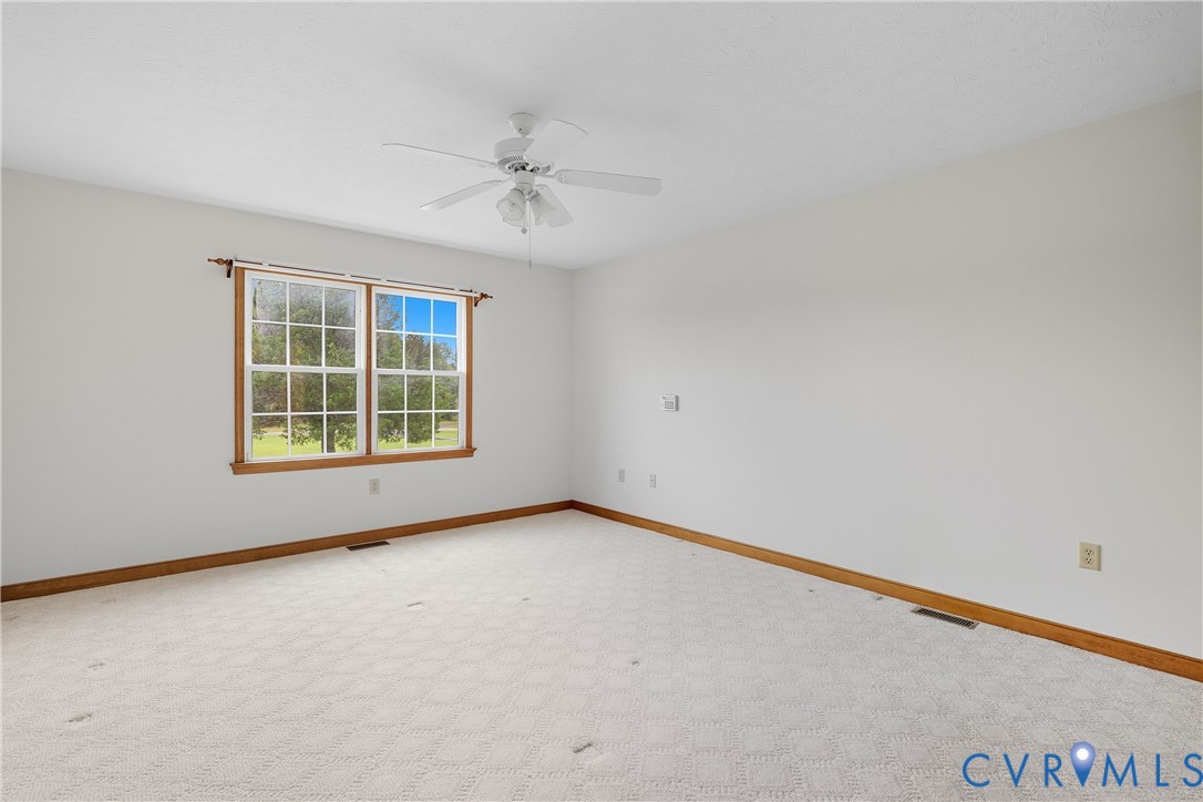 22419 Shippings Road McKenney, VA 23872 - Photo 12 of 35 an empty room with a window
