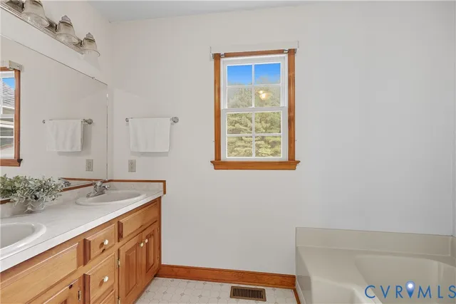 a view of bathroom with a shower and a sink